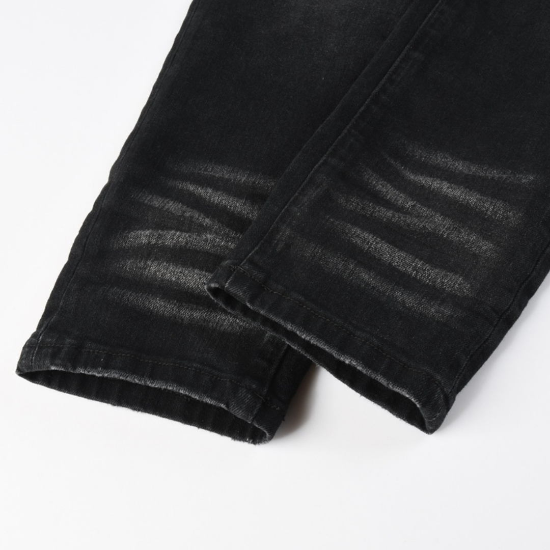 Jean noir déchiré Amr Bandana