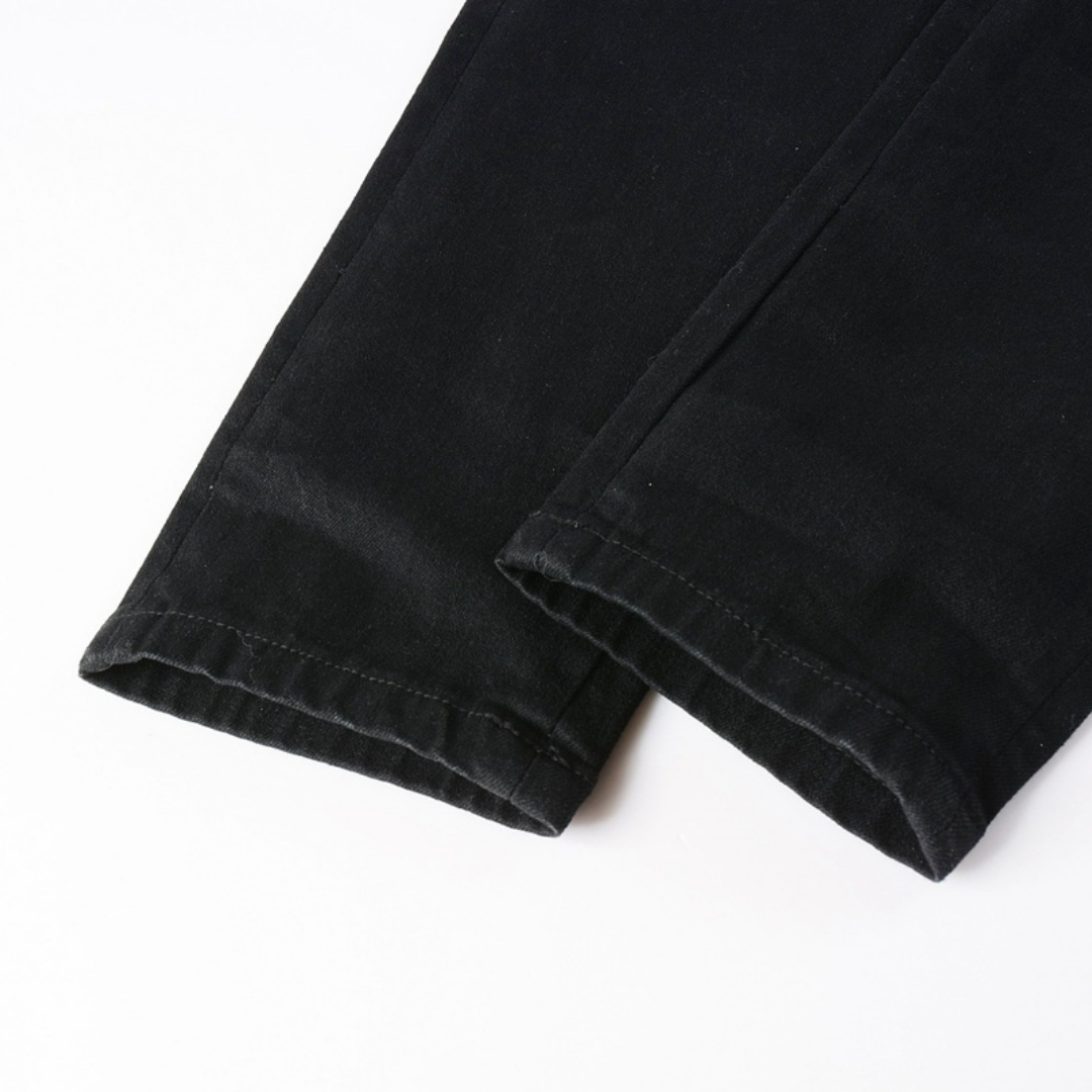 Jean blanc déchiré à logo Amr