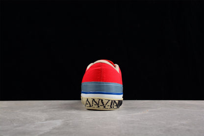 Baskets basses en toile aux couleurs vives