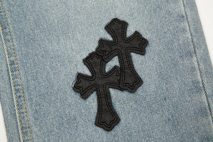 Jean vintage bleu à écusson croisé en forme de cœur chromé