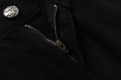 JEAN NOIR À PÂTE EN CROIX JAUNE ET CŒURS CHROMÉS