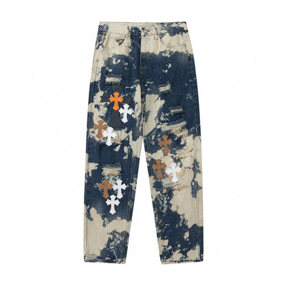 JEANS BLANC ORANGE À CŒURS CHROMÉS TIE-DYE ET ÉCUSSONS CROISÉS