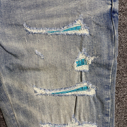 JEANS À LOGO UNIVERSITAIRE AMIRI