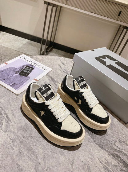 Baskets Golden Goose crème et noires à étoiles