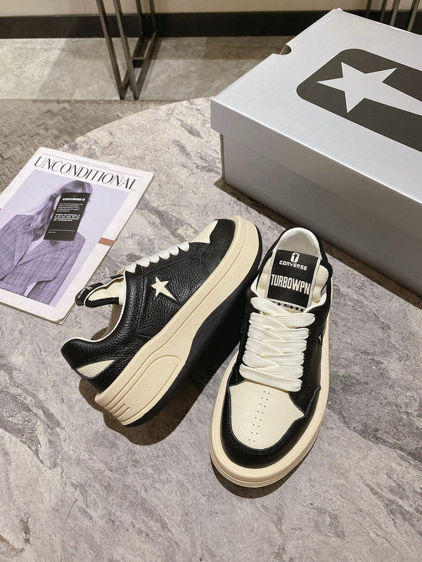 Baskets Golden Goose crème et noires à étoiles