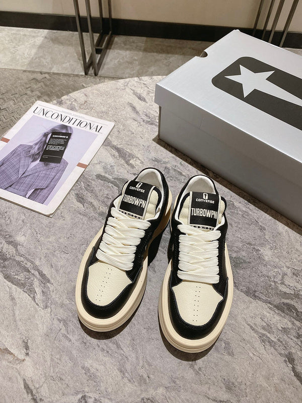 Baskets Golden Goose crème et noires à étoiles