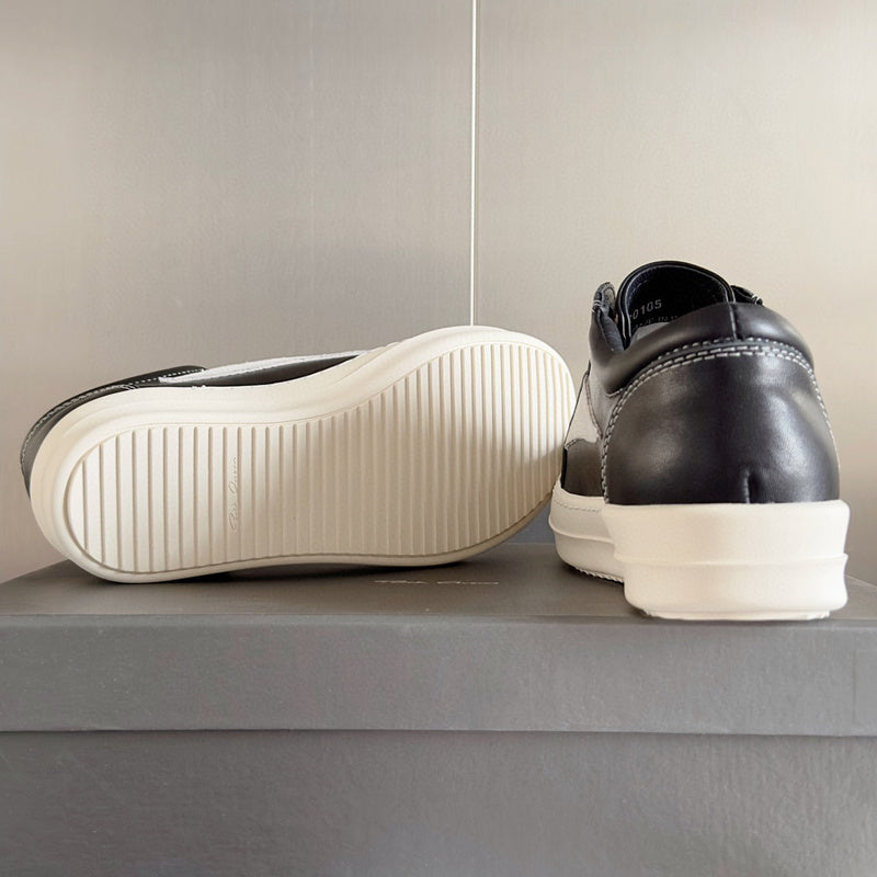 Baskets basses Rick Owens en cuir noir et daim