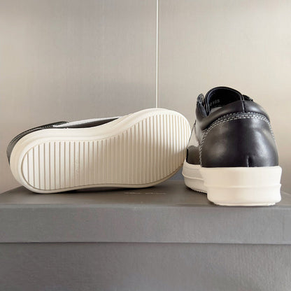 Baskets basses Rick Owens en cuir noir et daim