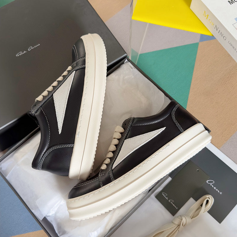 Baskets basses Rick Owens en cuir noir et daim