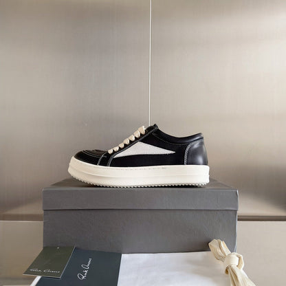 Baskets basses Rick Owens en cuir noir et daim