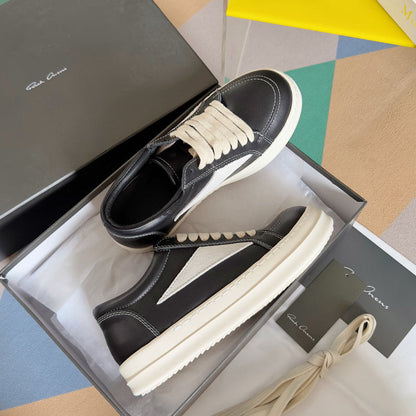 Baskets basses Rick Owens en cuir noir et daim