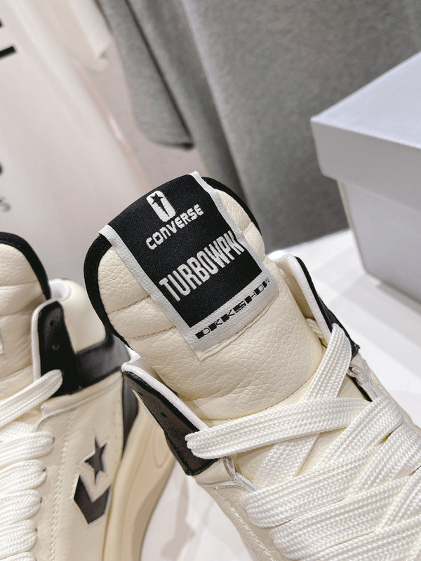 Baskets montantes Rick Owens crème et noires