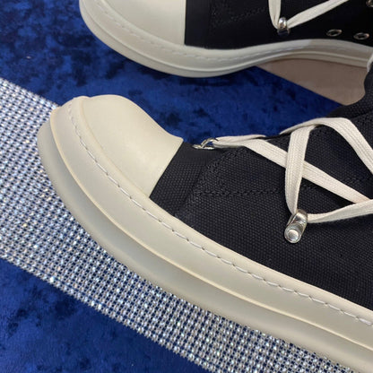 Bottes montantes en toile Rick Owens - Noires et blanches