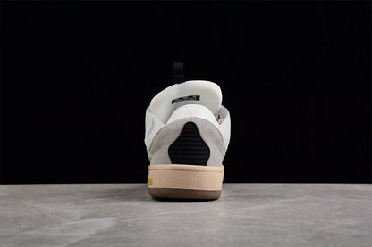 Baskets basses blanches à lacets multicolores