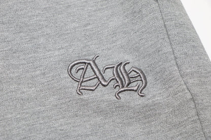 Short gris avec logo de fer à cheval et cœurs chromés 