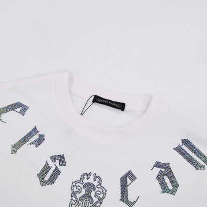 T-SHIRT BLANC À MOTIFS DE CŒURS CHROMÉS ET PAILLETTES