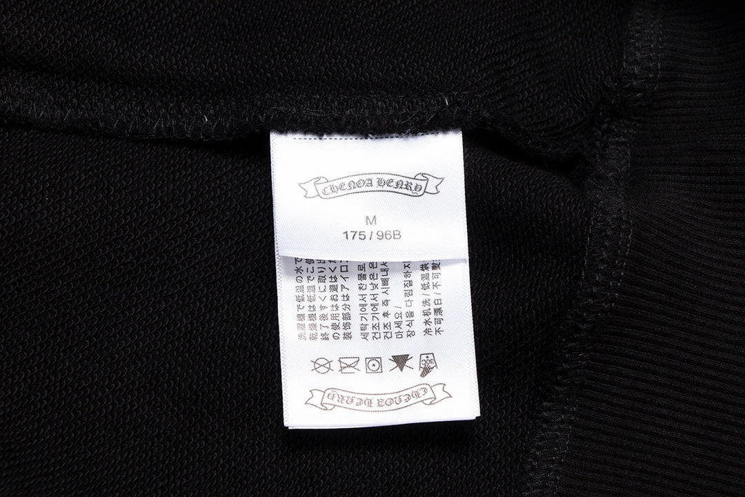 Sweat-shirt noir avec logo fer à cheval et cœurs chromés