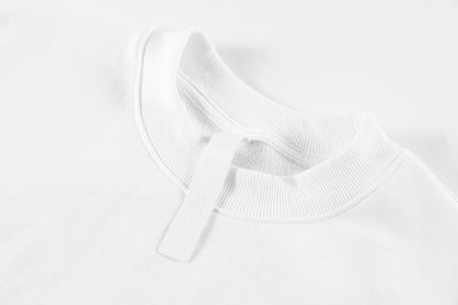 Sweat-shirt blanc avec logo de fer à cheval rose et cœurs chromés