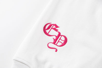 Sweat-shirt blanc avec logo de fer à cheval rose et cœurs chromés
