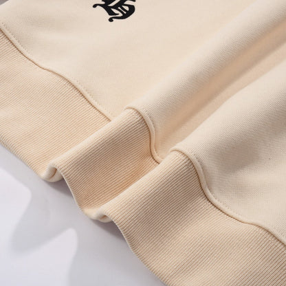 SWEAT-SHIRT BEIGE À ÉCUSSON CŒURS CHROMÉS ET CROIX BLANCHES