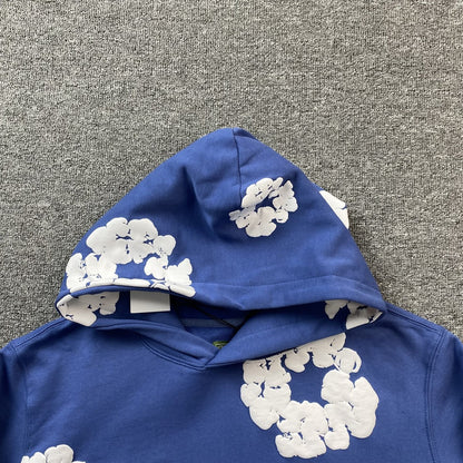 Sweat à capuche bleu en coton avec motif de déchirures de denim
