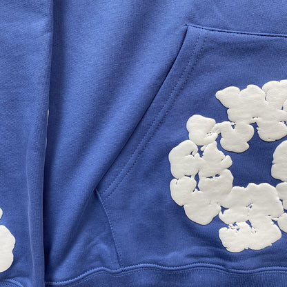 Sweat à capuche bleu en coton avec motif de déchirures de denim