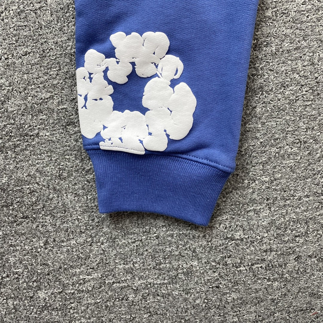 Sweat à capuche bleu en coton avec motif de déchirures de denim