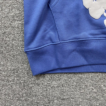 Sweat à capuche bleu en coton avec motif de déchirures de denim