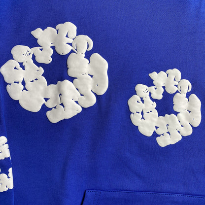 Sweat à capuche en coton bleu foncé à motif de déchirures de denim