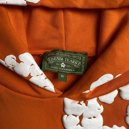 Sweat à capuche orange en coton avec motif de déchirures de denim