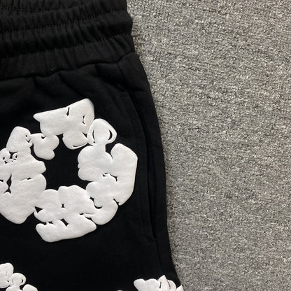 Short en coton noir à motif couronne déchirée en denim