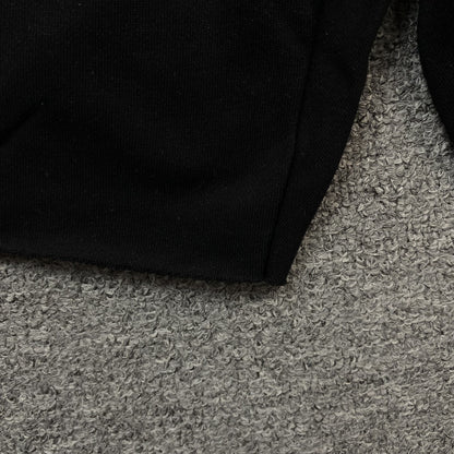 Short en coton noir à motif couronne déchirée en denim