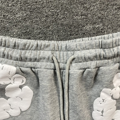 Short en coton gris déchiré à motif couronne