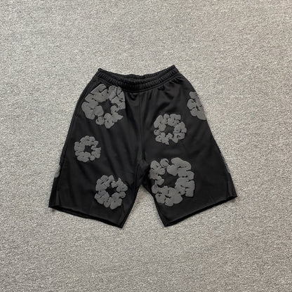 Short en coton à motif de déchirures en denim et couronne monochrome noir