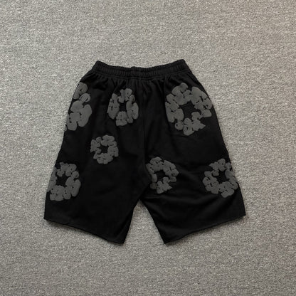 Short en coton à motif de déchirures en denim et couronne monochrome noir