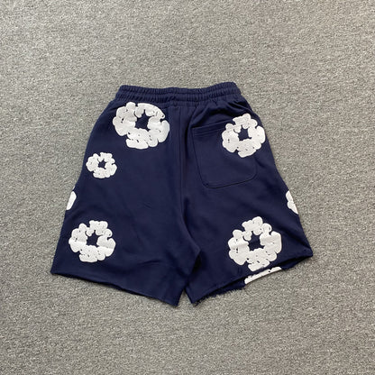 Short en coton déchiré bleu marine avec couronne