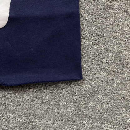 Short en coton déchiré bleu marine avec couronne