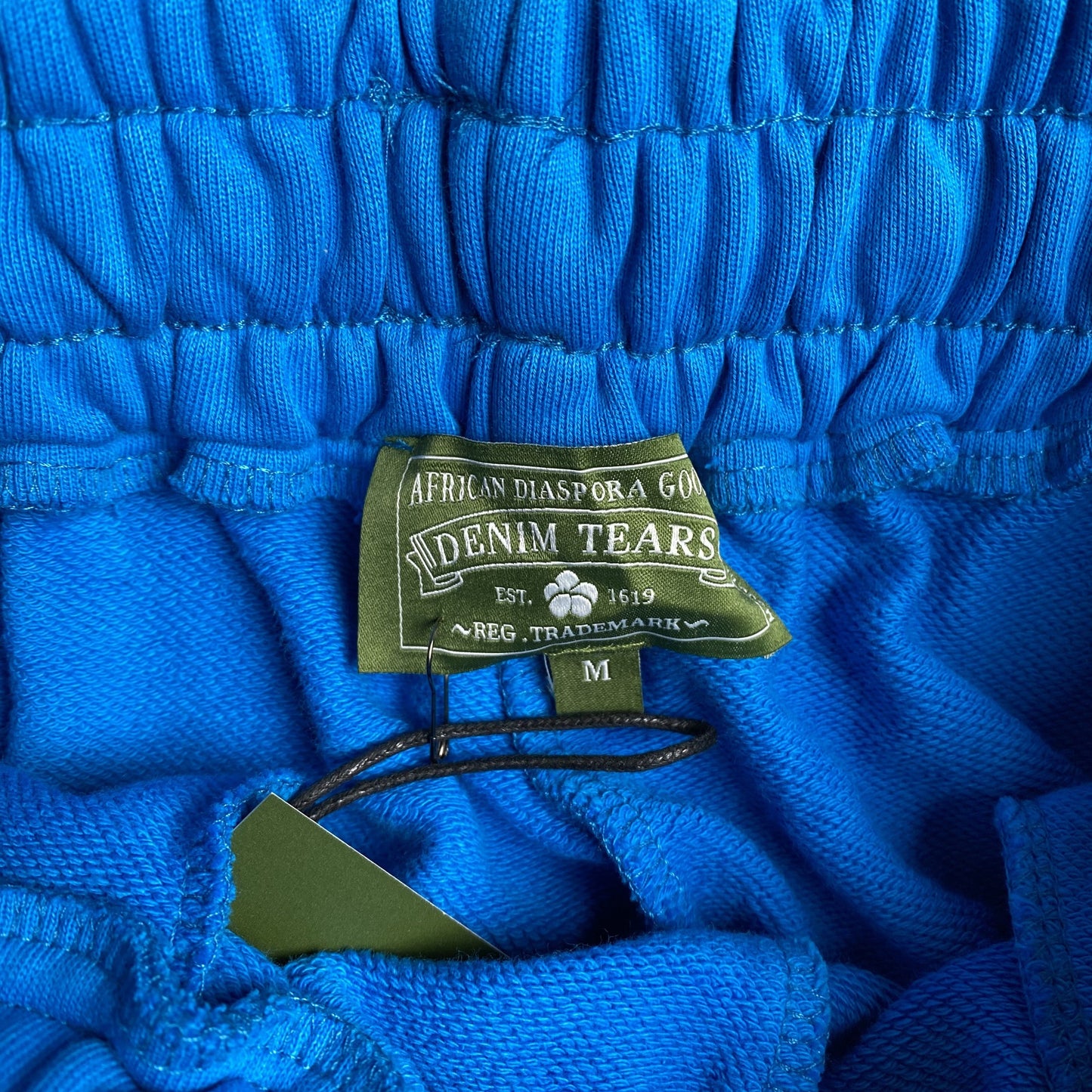 PANTALON DE SURVÊTEMENT EN COTON AVEC COURONNE DE DENIM TEARS BLEU AZUR