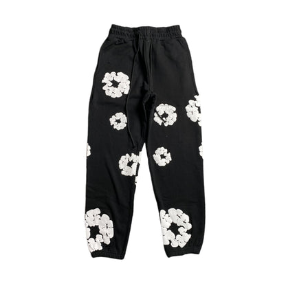 Pantalon de survêtement noir en coton déchiré et couronne