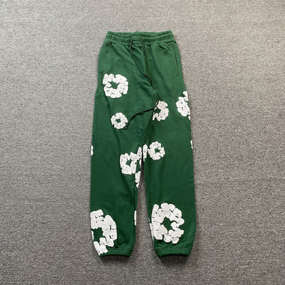 PANTALON DE SURVÊTEMENT EN COTON À MOTIFS DÉCHIRÉS VERT FONCÉ