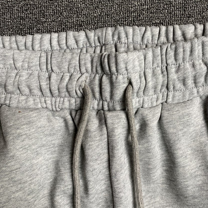 PANTALON DE SURVÊTEMENT GRIS EN COTON ET DENIM TEARS