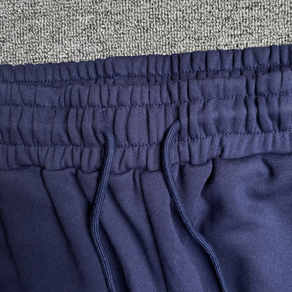 PANTALON DE SURVÊTEMENT EN DENIM TEARS COURONNE DE COTON MARINE