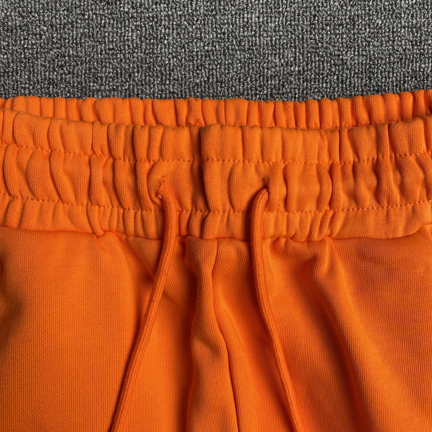 PANTALON DE SURVÊTEMENT ORANGE EN COTON ET DENIM TEARS