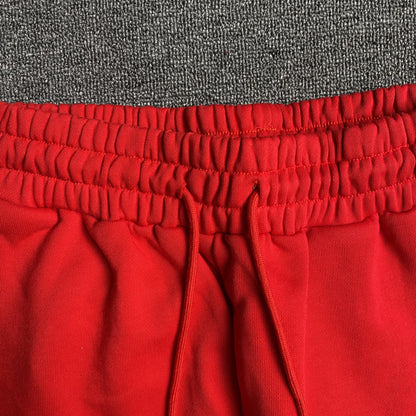 PANTALON DE SURVÊTEMENT ROUGE EN DENIM TEARS ET COTON AVEC COURONNE