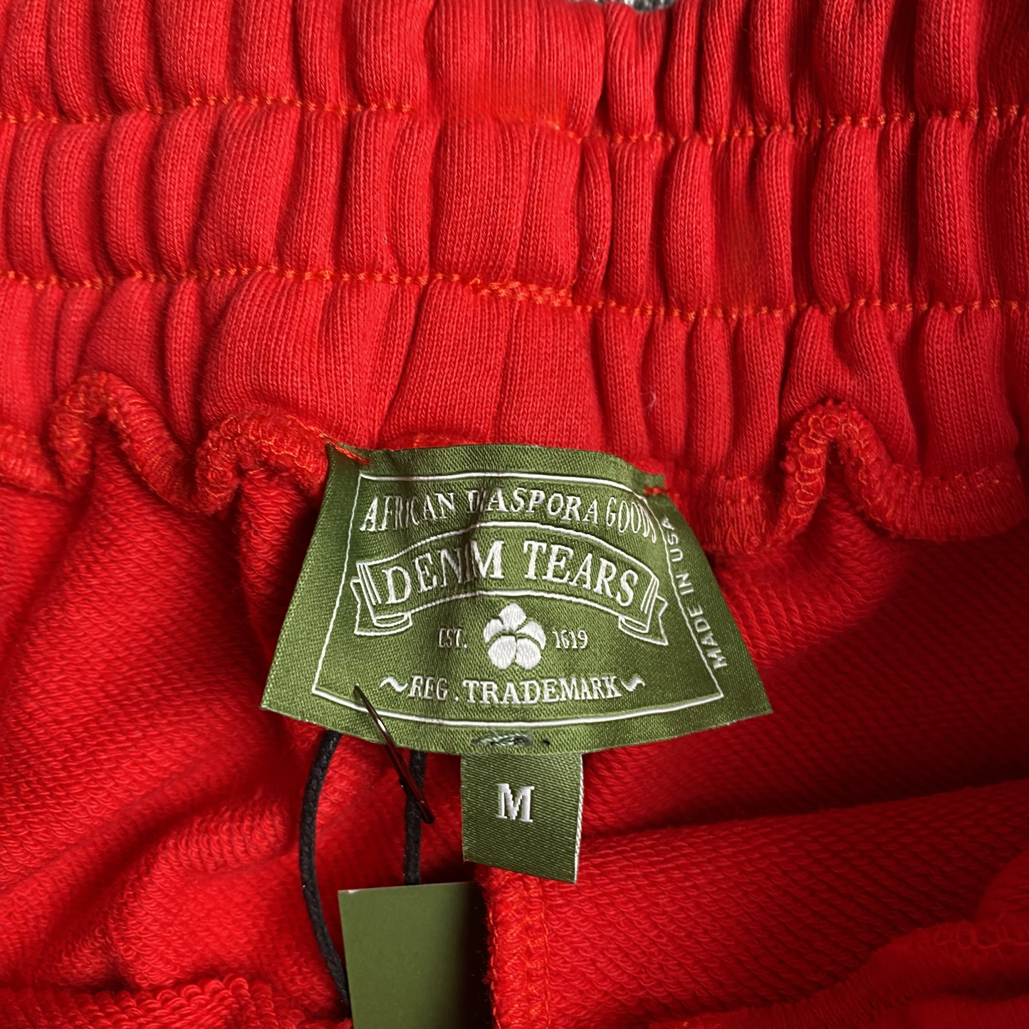 PANTALON DE SURVÊTEMENT ROUGE EN DENIM TEARS ET COTON AVEC COURONNE