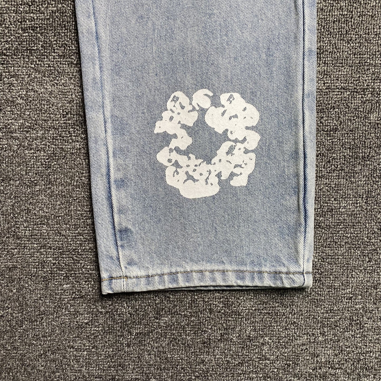 DENIM TEARS x LEVI'S COTTON WREATH JEANS DÉLAVAGE LÉGER