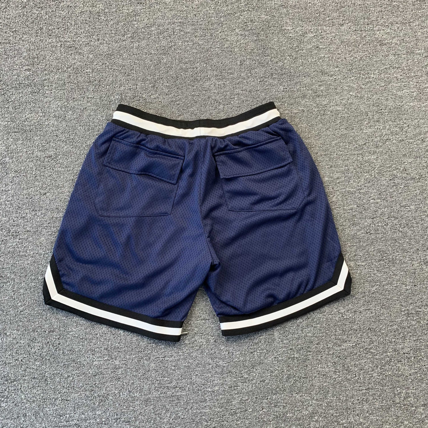 Short bleu marine avec logo RHUDE COURT