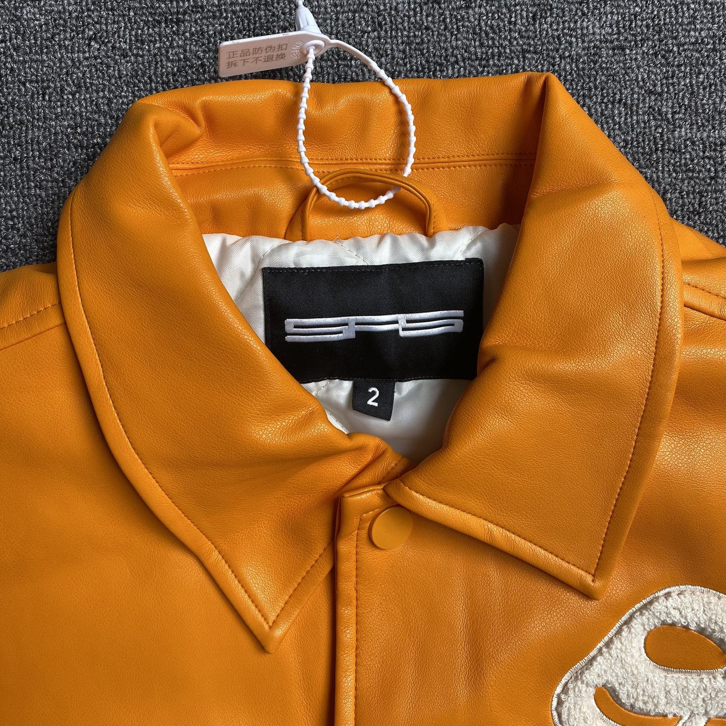 VESTE UNIVERSITAIRE EN CUIR SP5DER ORANGE