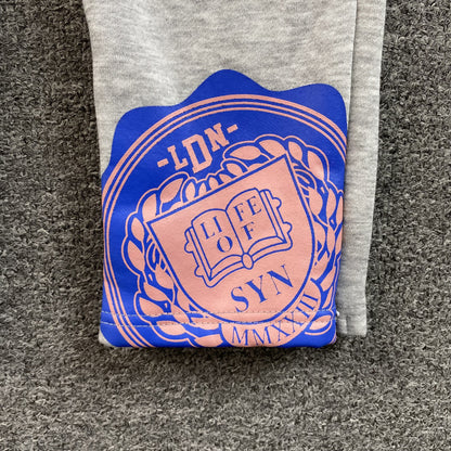 PANTALON DE SURVÊTEMENT GRIS SYNA WORLD COLLEGE