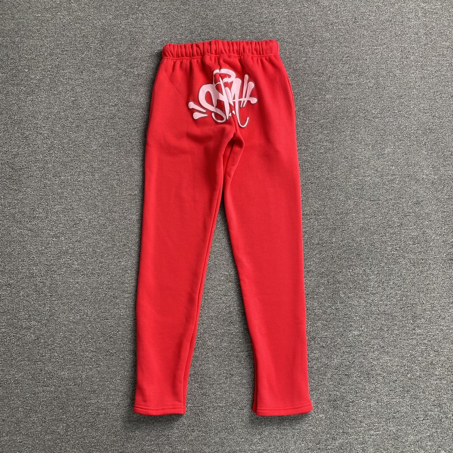 Pantalon de survêtement rouge SYNA WORLD avec logo SYNA